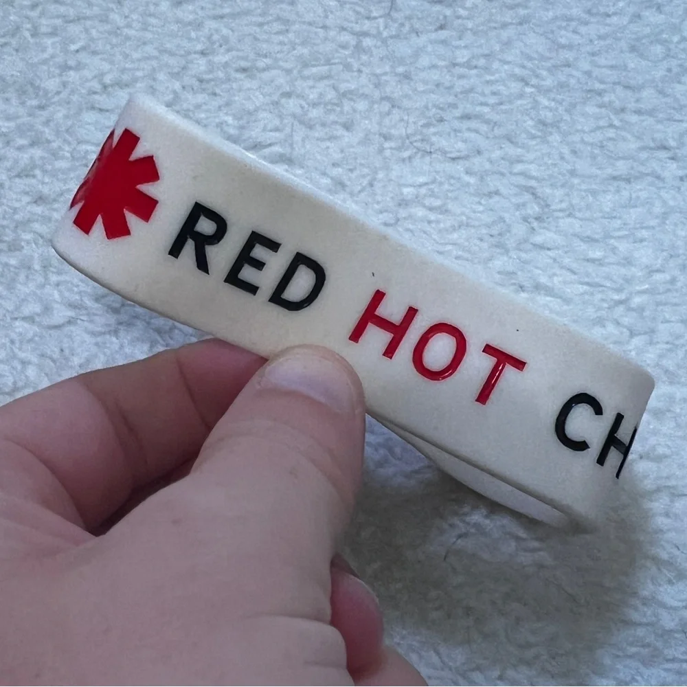 Bundle of 4 Rubber Rock Band Bracelets NWT